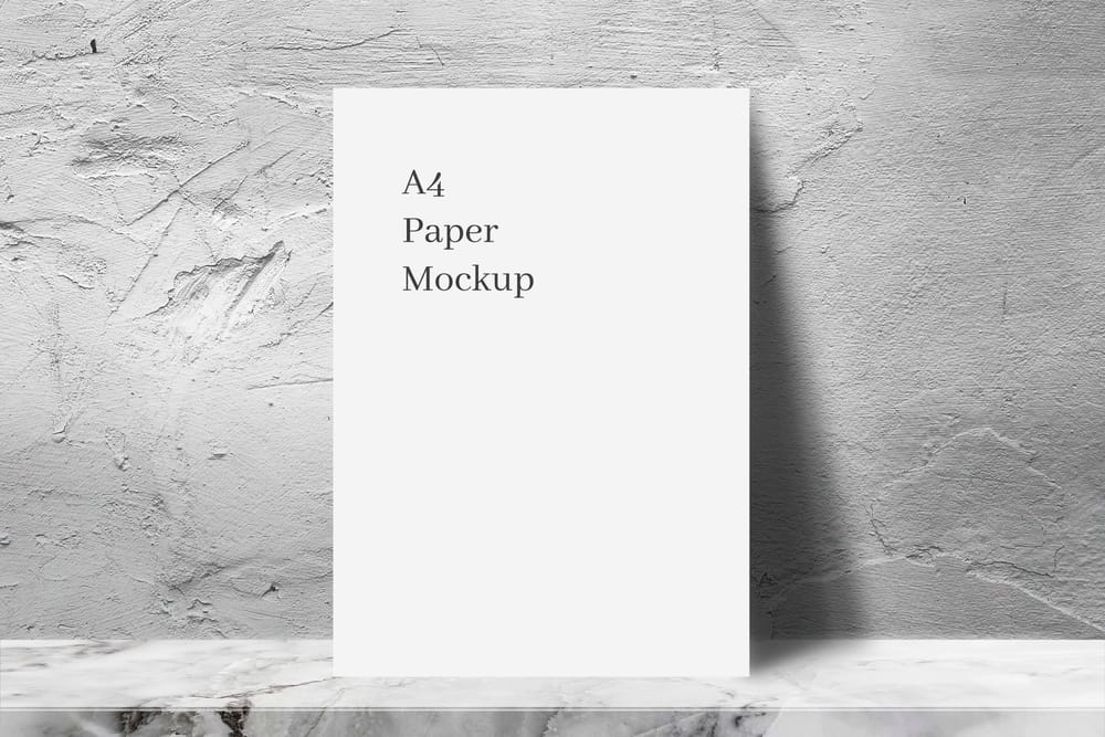 A4 White Paper Mockup with Rough Cement Wall Texture