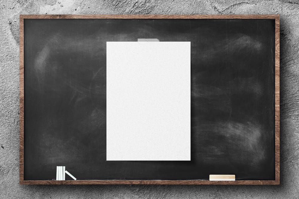 A4 Poster Mockup on Black Chalkboard