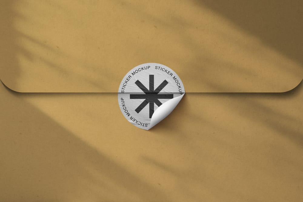 Glued Sticker Mockup With Envelope Background