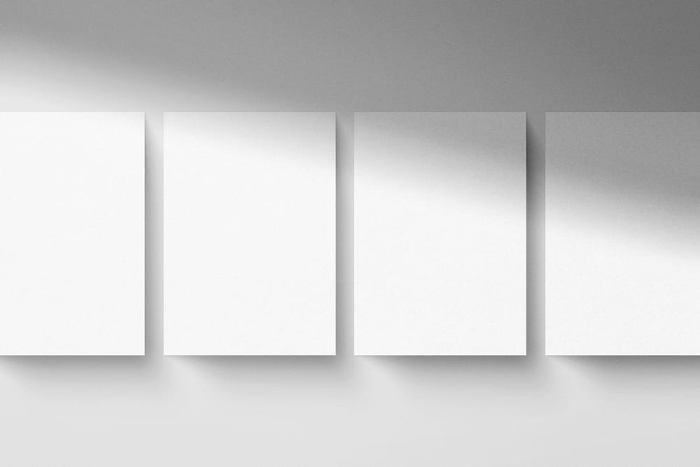 Four A4 Poster Mockup Scene