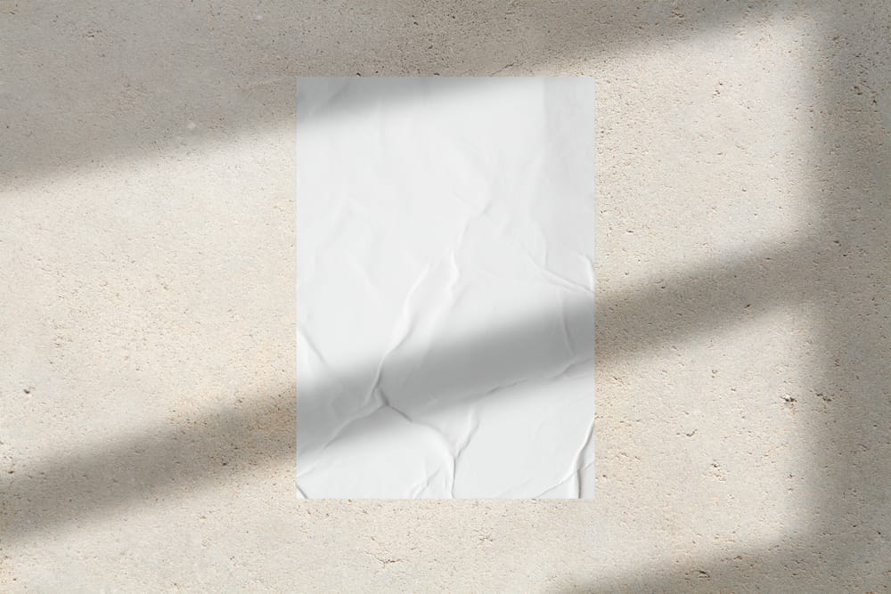 Glued Poster Mockup on Beige Textured Wall