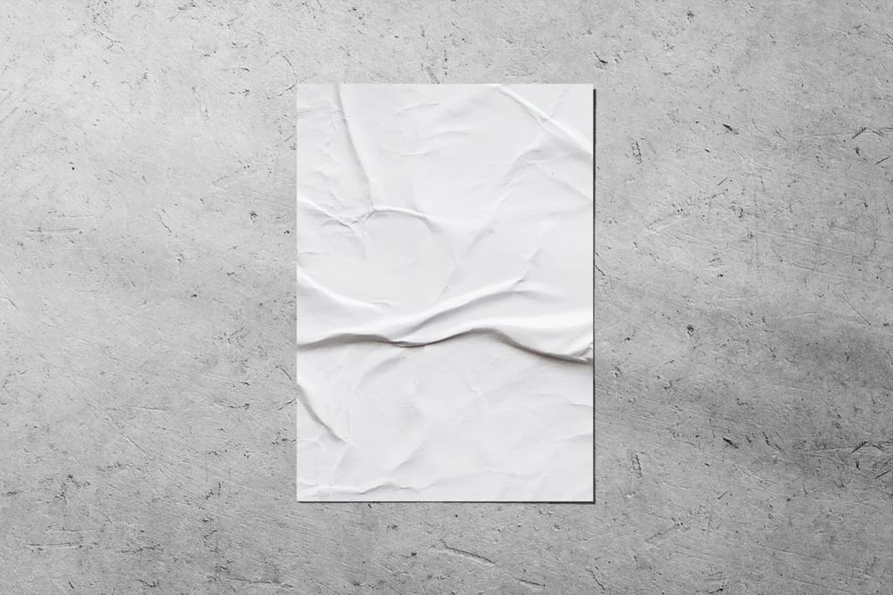 Glued Poster Mockup on Grunge Wall Surface
