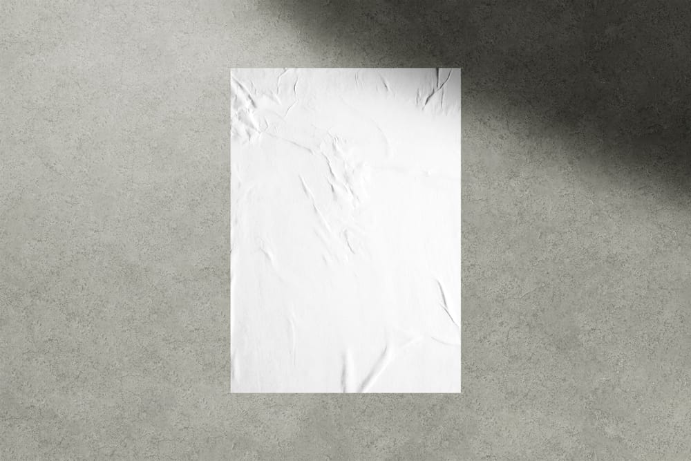 Glued Poster Mockup on Wall Background