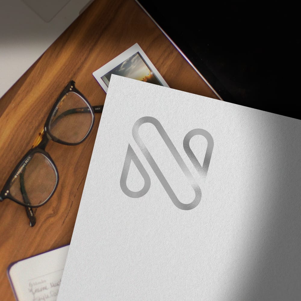 Silver Logo Mockup With Table Wood