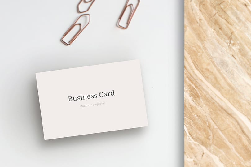 Business Card Mockup on White Background With Marble & Paper Clip