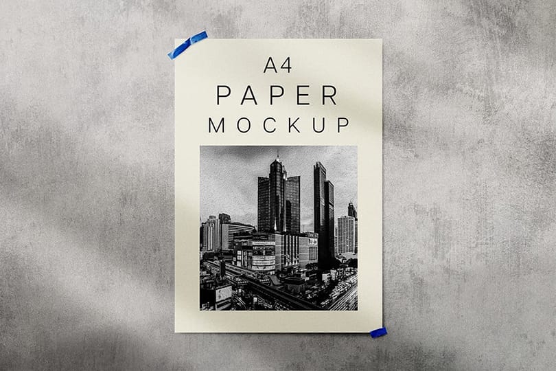 Realistic A4 Paper Mockup on Grunge Plaster Wall