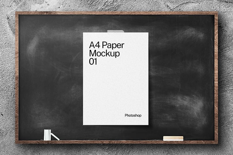 White A4 Paper Mockup Sticked on Black Chalkboard