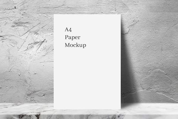 A4 White Paper Mockup with Rough Cement Wall Texture