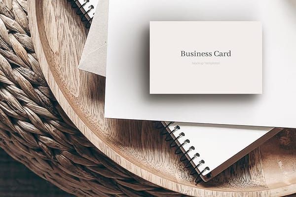 Business Card Mockup on Rattan Podium With Book