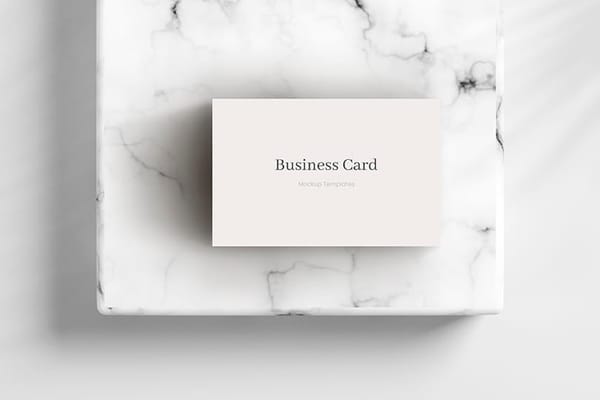 Business Card Mockup on White Marble Podium