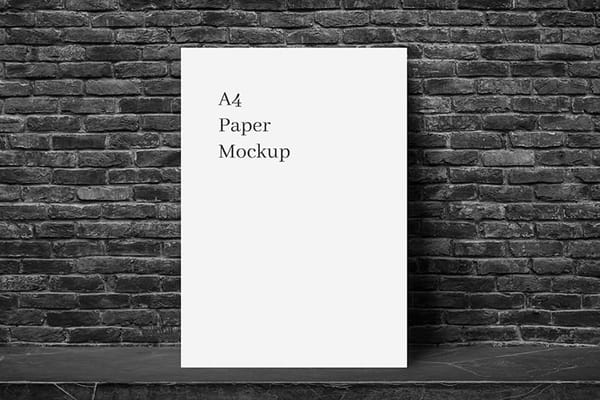 Minimal White A4 Paper Mockup with Brick Stone Wall Background