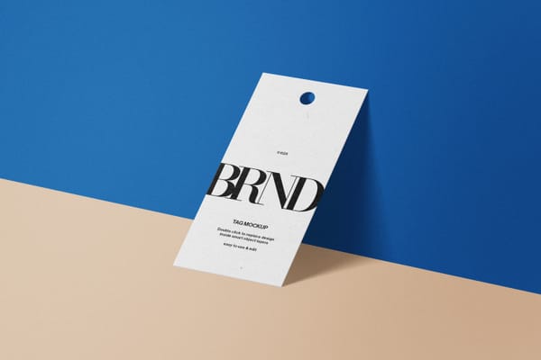 Hangtag mockup leaning on a wall 2
