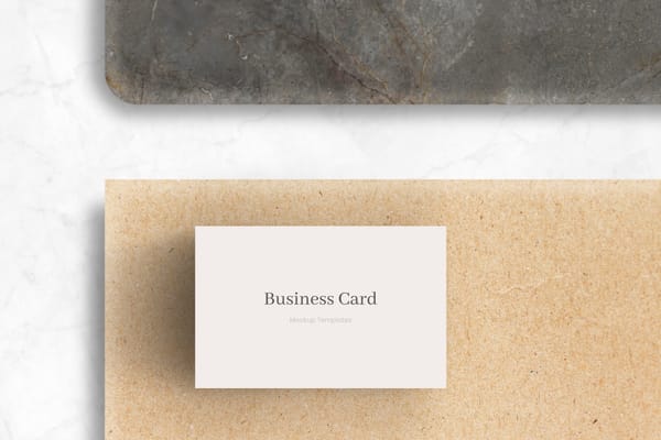 White Business Card Mockup Lay on Textured Ground