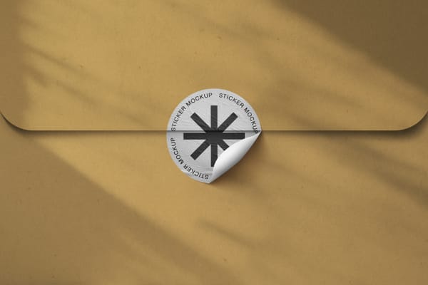 Glued Sticker Mockup With Envelope Background