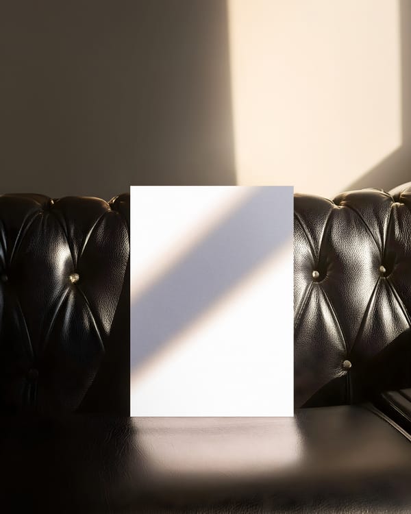 Creative Poster Mockup on Sofa with Natural Shadow