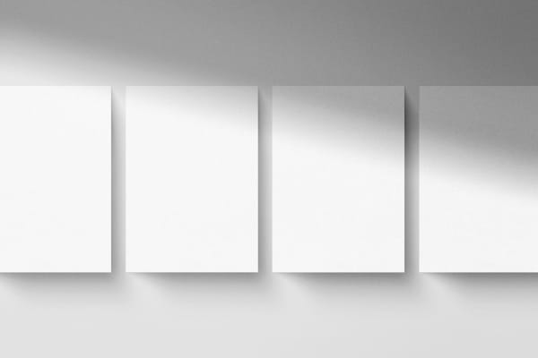 Four A4 Poster Mockups Scene