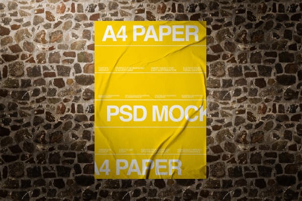 Glued Poster Mockup On Rock Wall Background
