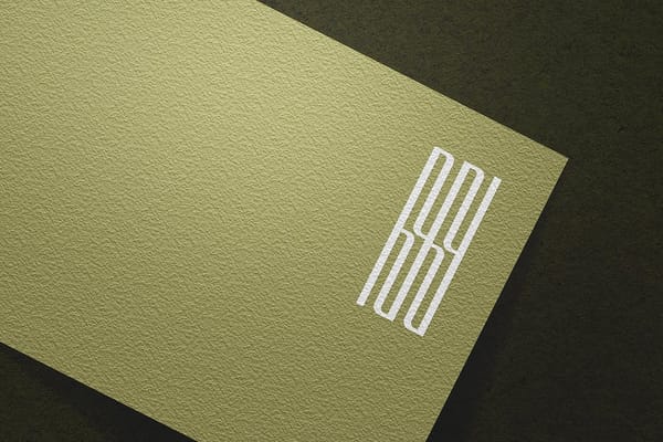 Modern Linear Logo Mockup on Rough Paper Background