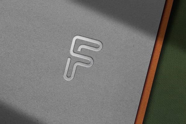 Silver Emboss Logo Mockup On Paper Texture