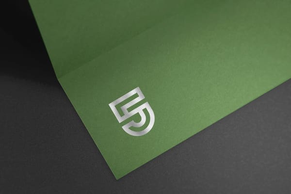 Silver Logo Mockup On Black Background