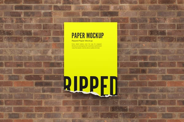 Yellow Ripped Paper Mockup on Brick Wall