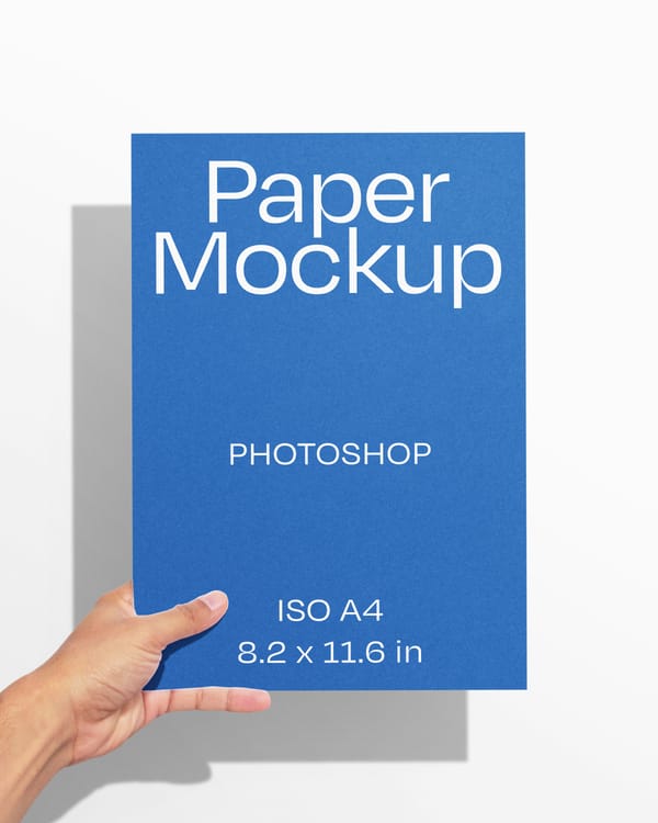 Hand Holding A4 Paper Mockup